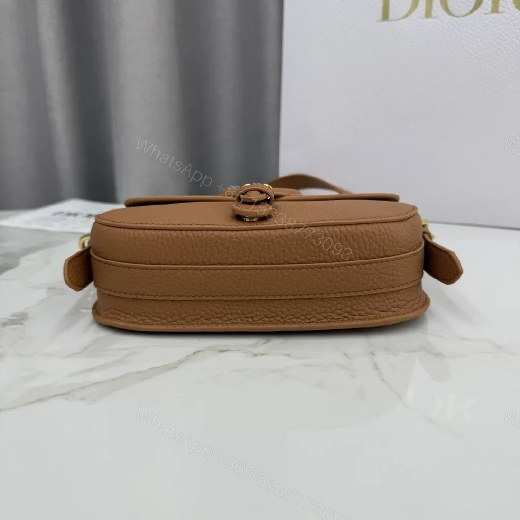 View 4 of Saddle Tan Leather Bag: Chic, Compact, Day-to-Night Luxury