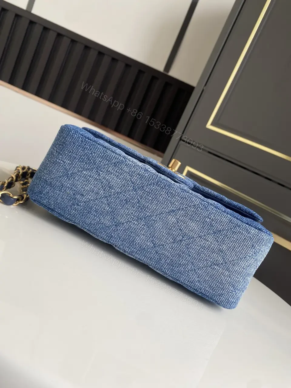 View 9 of Light Blue Denim Quilted Flap Bag with Gold CC Chain Strap