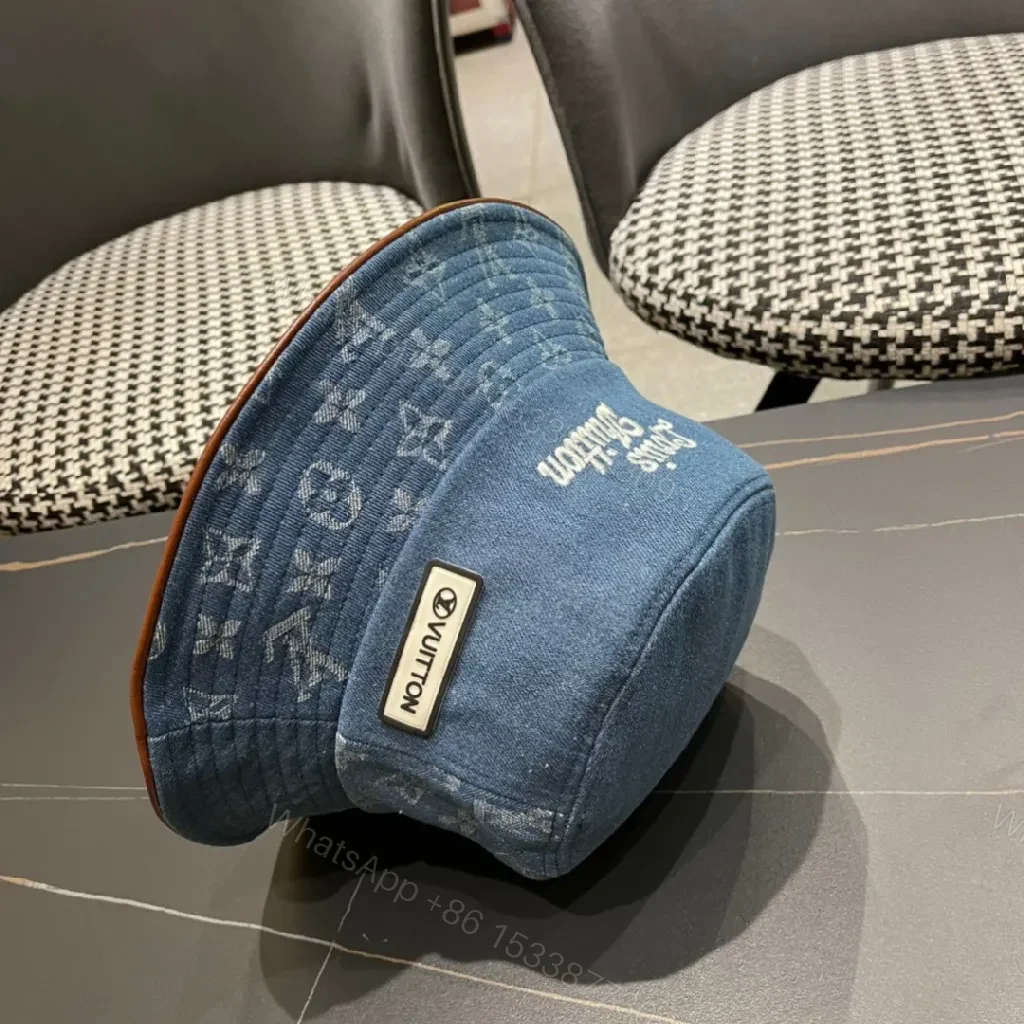 View 9 of Denim Bucket Hat with Monogram Detail – Sun Protection