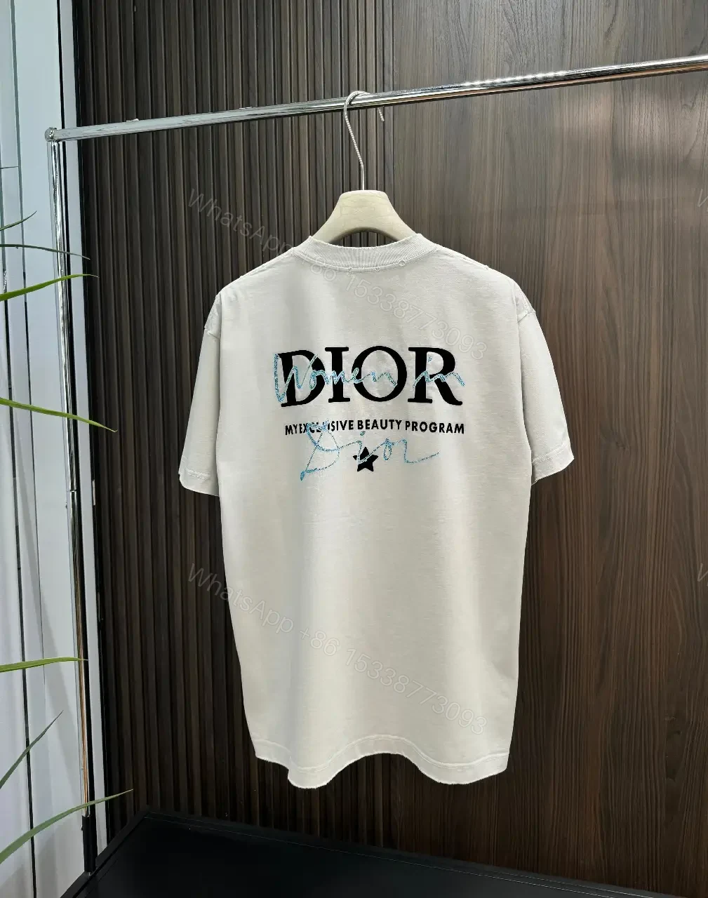 View 7 of Minimalist Logo Tee: Elevated Everyday Comfort, Off-White, Cotton Blend, Relaxed Fit, Short Sleeve Tee