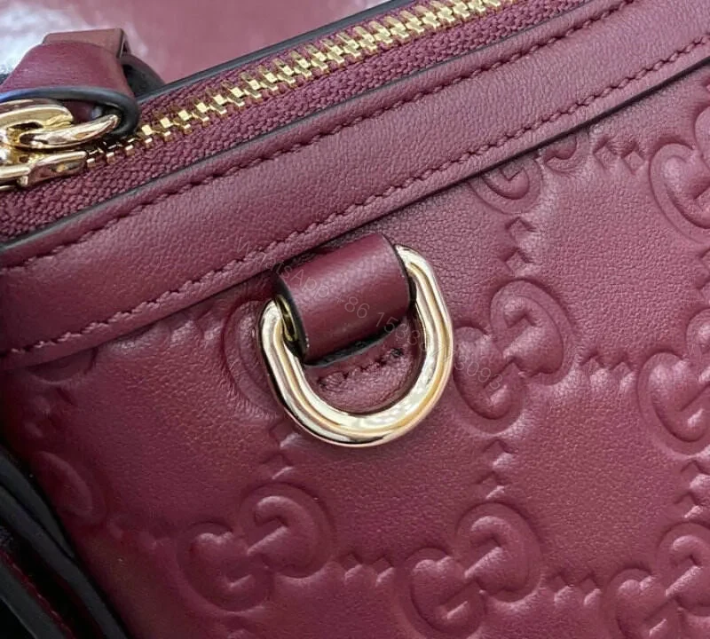 View 7 of Gucci GG Emblem Small Shoulder Bag – Rosso Ancora Red Leather