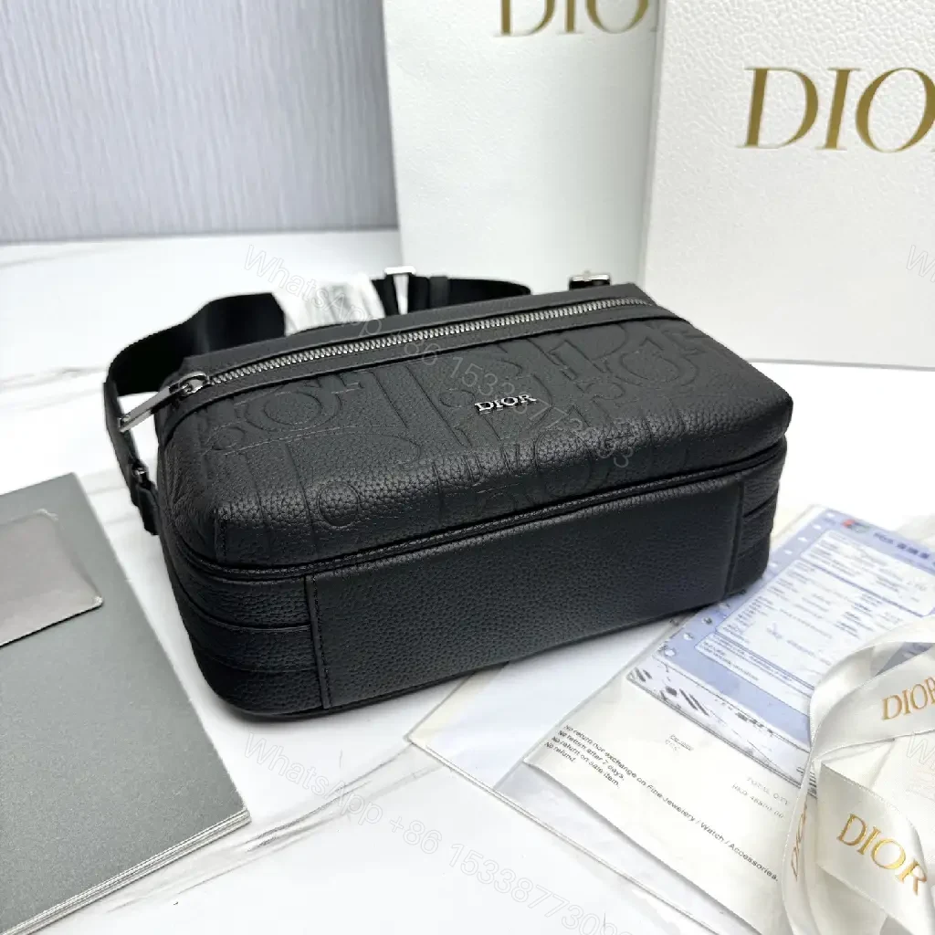 View 2 of Compact Leather Crossbody Bag - Embossed Texture, Luxury Minimalism