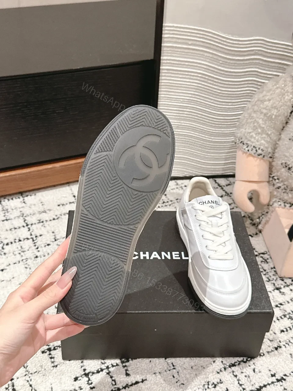 View 3 of Minimalist White Leather Sneakers with Subtle Chanel Detailing