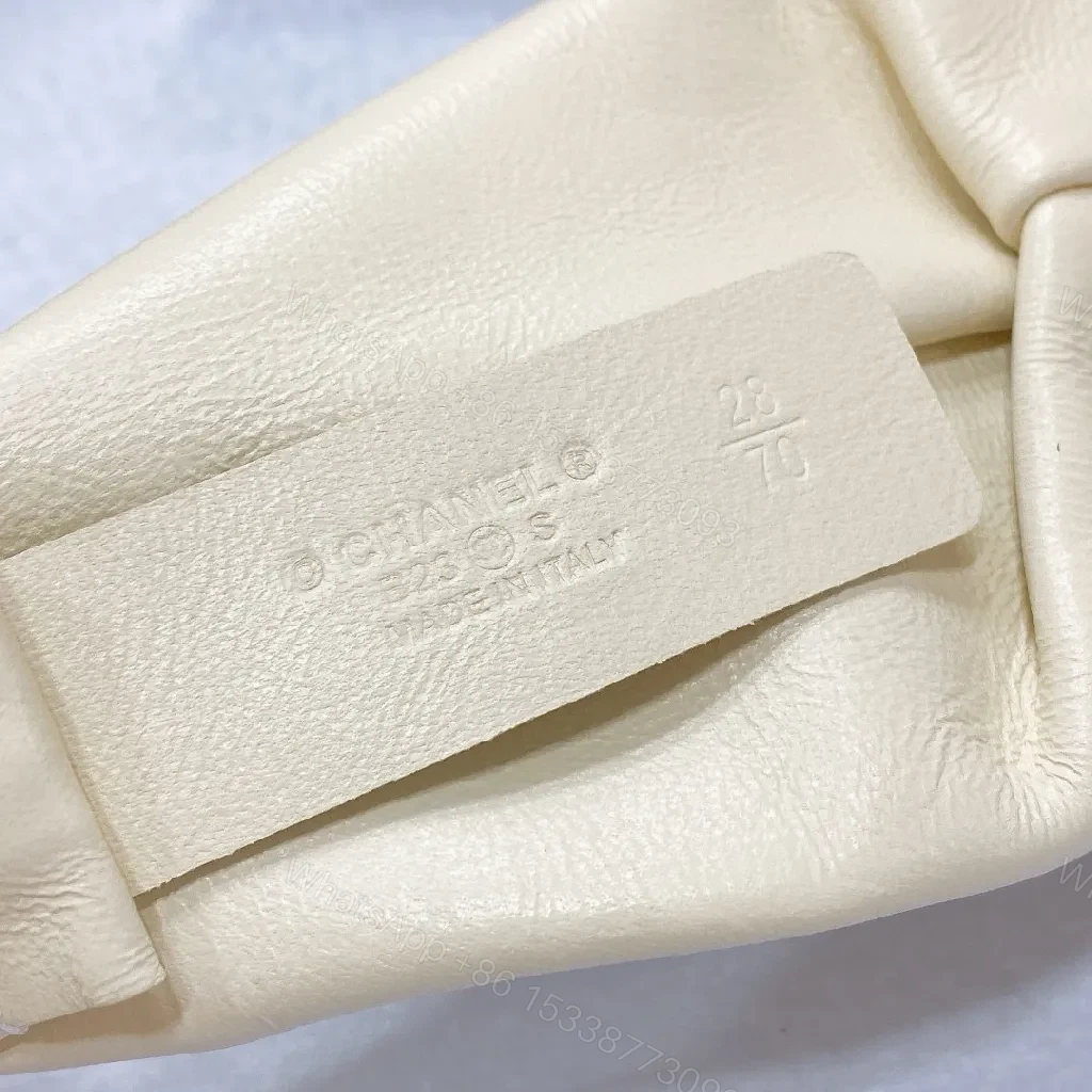View 8 of Ivory Faux Leather Headband with Gold Logo Emblem - Chic, Everyday Glam