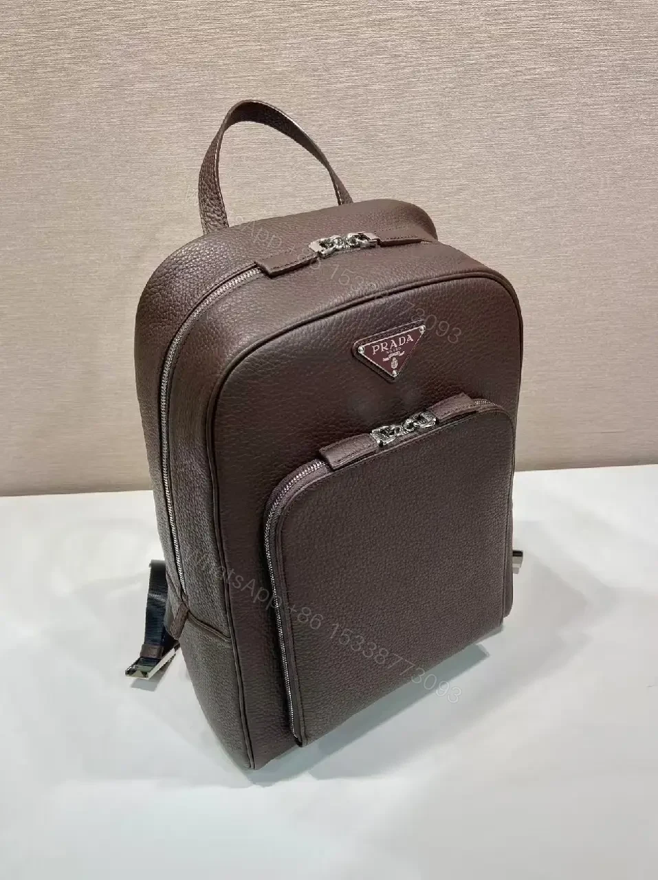 View 3 of Structured Luxury Leather Backpack: Modern Texture, Practical Detailing