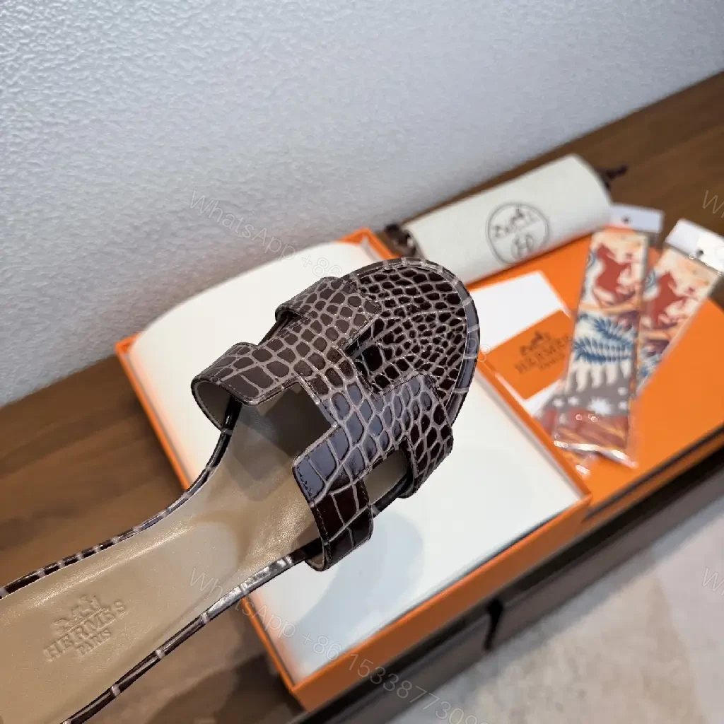 View 2 of Brown Croc-Embossed Leather Slip-Ons with Signature Footbed, Hermes Style