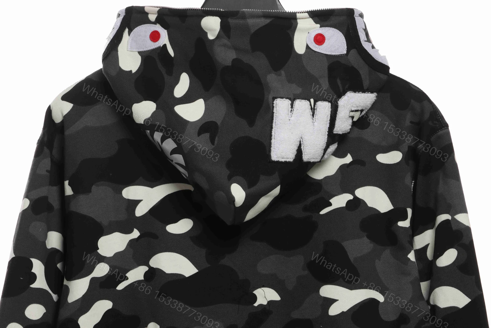 View 3 of BAPE classic black and white camouflage patchwork luminous hoodie Black