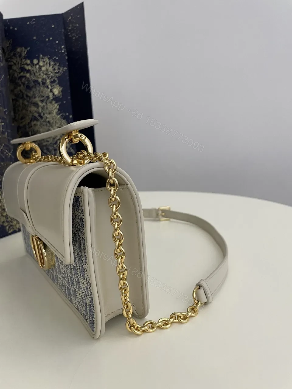 View 2 of Textured Jacquard Evening Bag with Gold Hardware - Structured Chic