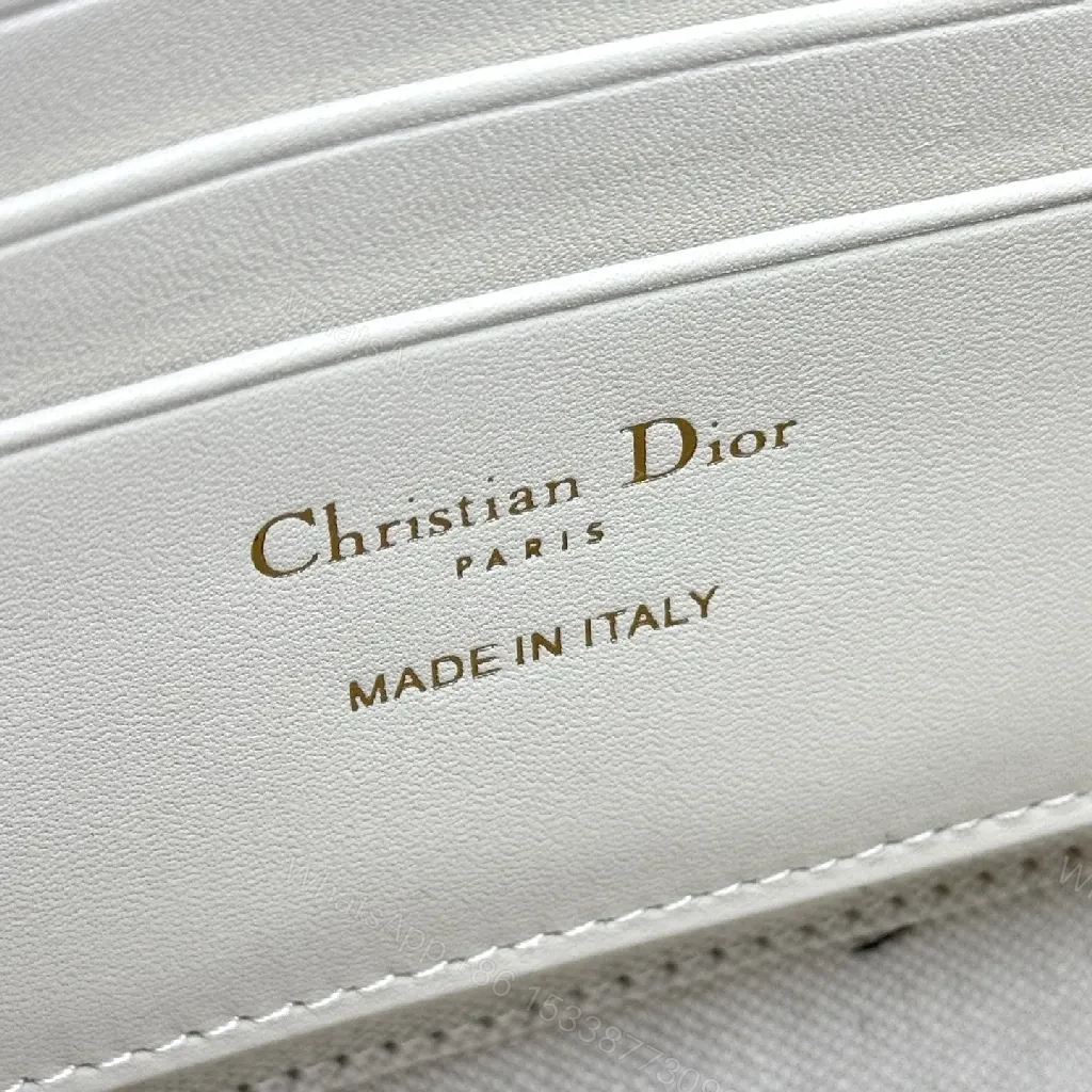View 4 of Textured Monogram Carryall: Structured Luxury Handbag