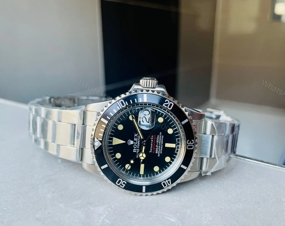 View 7 of VINTAGE Rolex Submariner Date Tiffany & Co 16610A30B9315 Black dial with SS bracelet