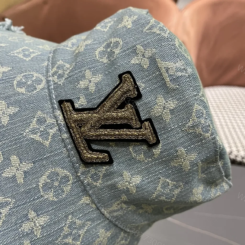 View 8 of Denim Bucket Hat with Monogram Detail – Casual Luxury & Comfort