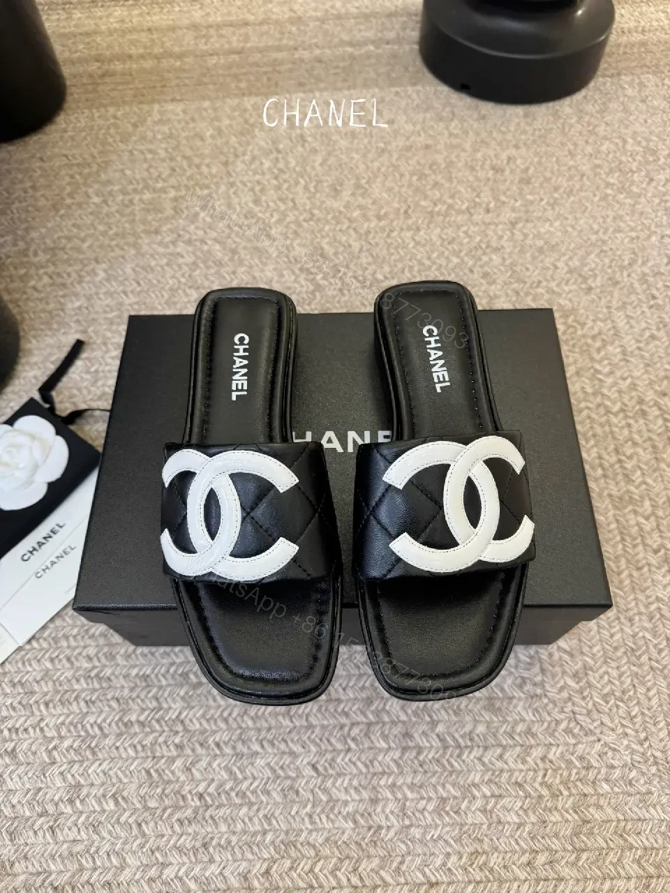 View 8 of Interlocking Logo Slip-Ons: Black & White Luxury Sandals