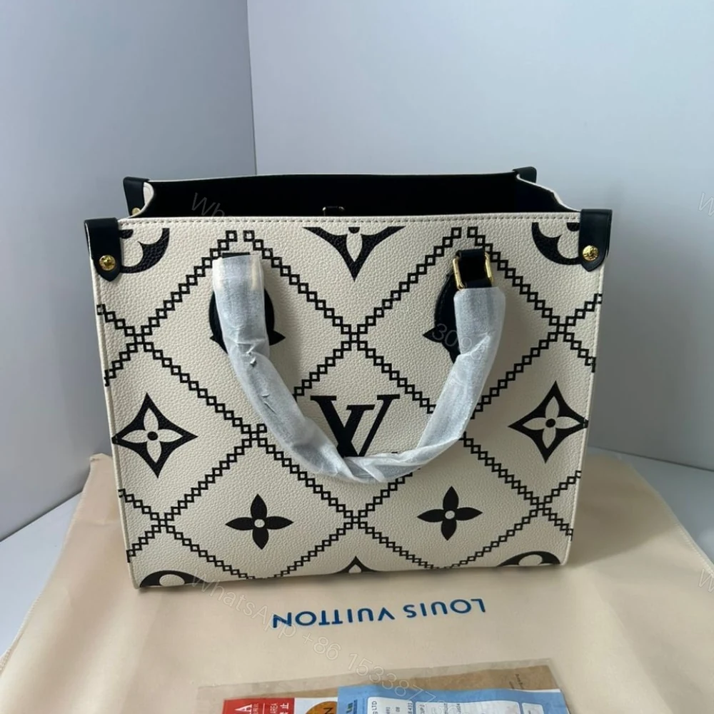 View 2 of Louis Vuitton Onthego MM White 35Cm M46016