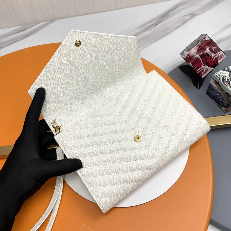 View 6 of Elegant Quilted Envelope Clutch with Gold-YSL Emblem, Ivory, Day-to-Night Essential