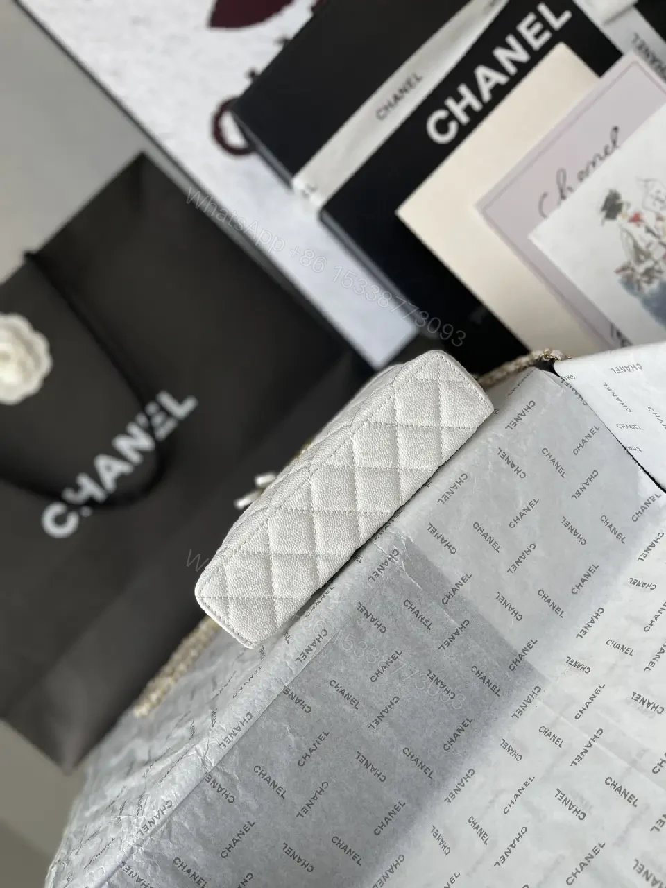 View 2 of Quilted Chic Mini Bag with Chain - Luxury Day-to-Night Accessory