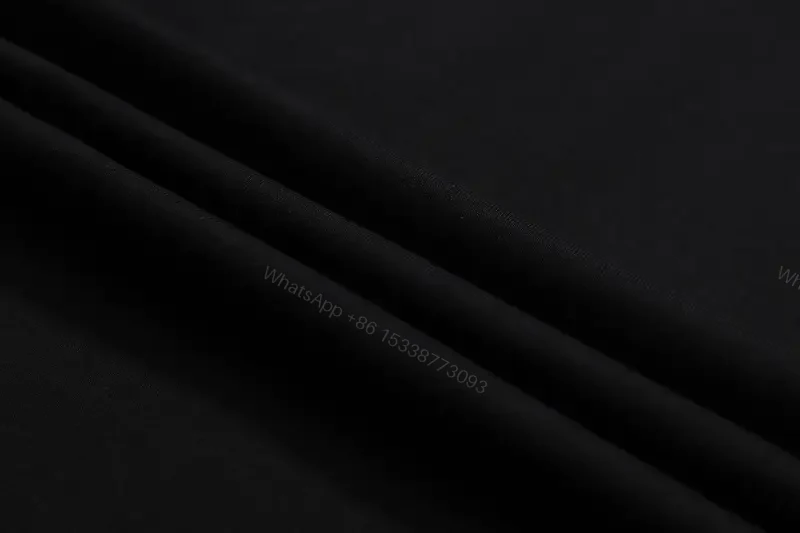 View 10 of Dark Black Cotton Tee with Off-White Logo Print – Relaxed Fit Shirt