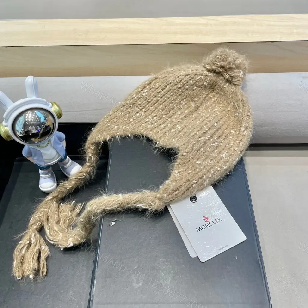 View 4 of Cozy Boucle Knit Beanie with Moncler Patch – Textured Warmth
