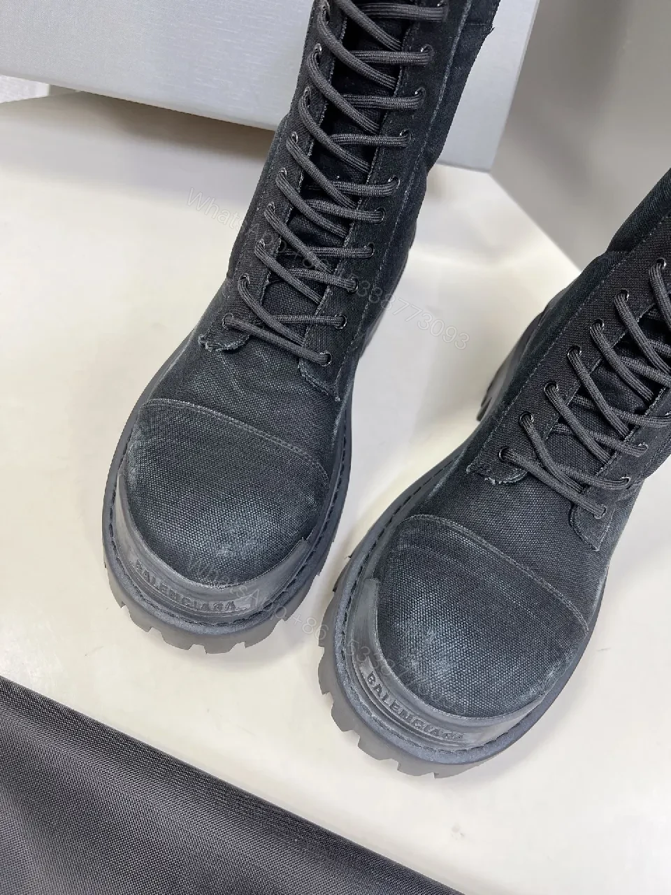 View 5 of Bold Black Combat Boots with Rugged Texture