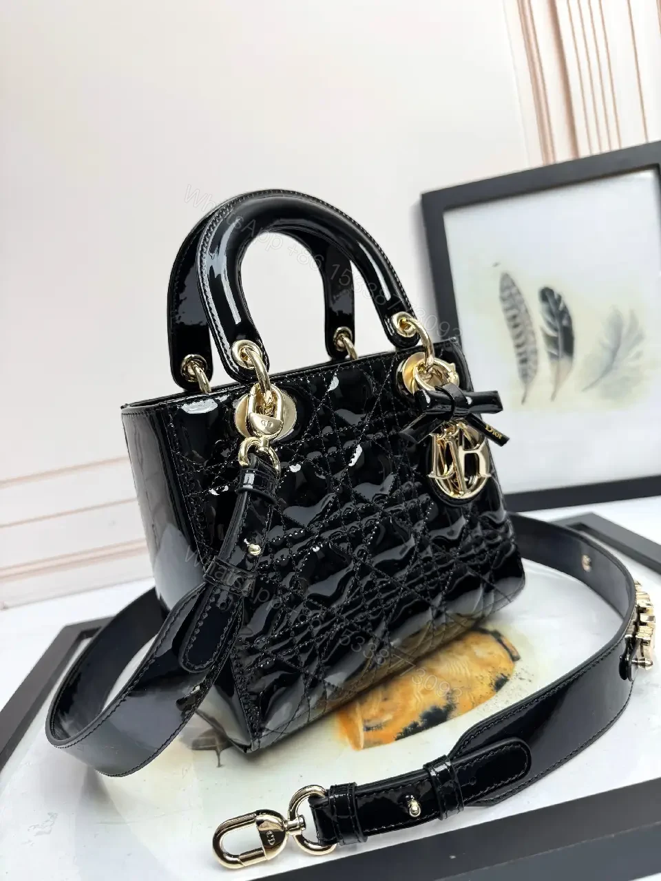 View 2 of Quilted Patent Mini Bag with Gold-Tone Charms, Black