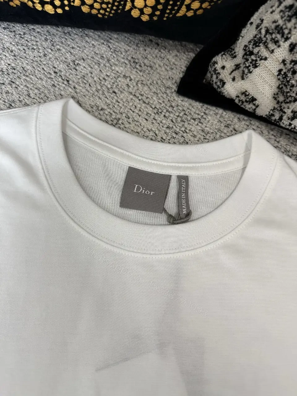 View 8 of Minimalist White Cotton Tee with Subtle Logo