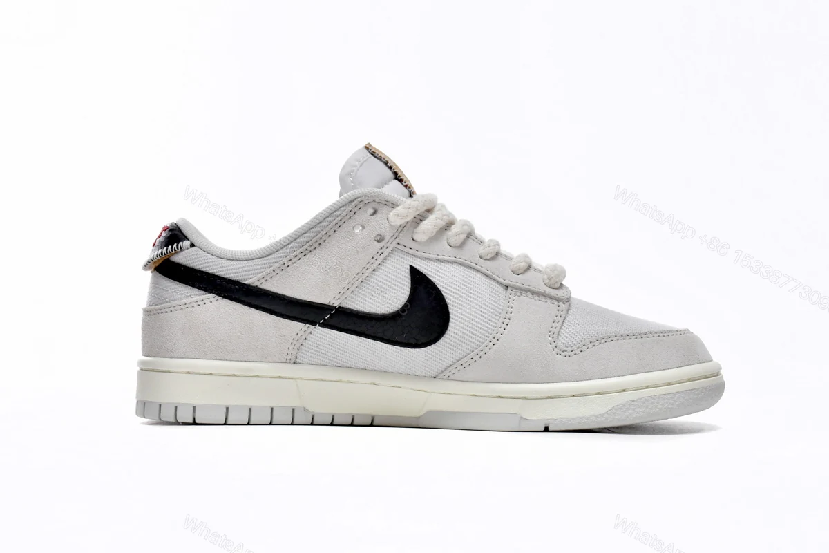 View 2 of Stussy x Nike SB Dunk Low DD9776-068