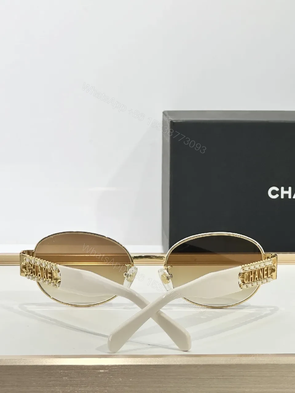 View 5 of Gold-Accented Round Sunglasses: Minimal Luxury Shield