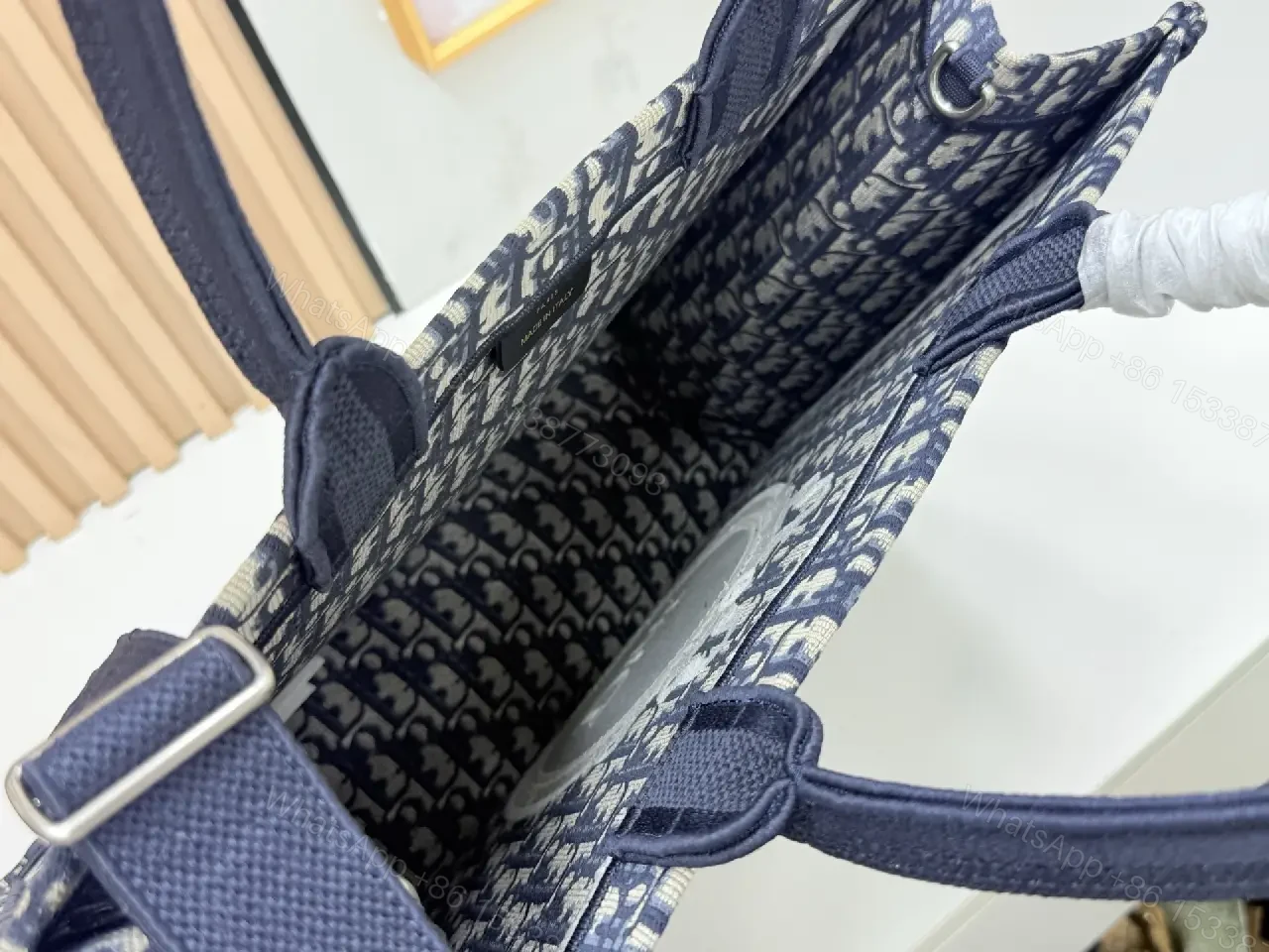 View 5 of Textured tote bag: structured luxury, bold lettering, durable
