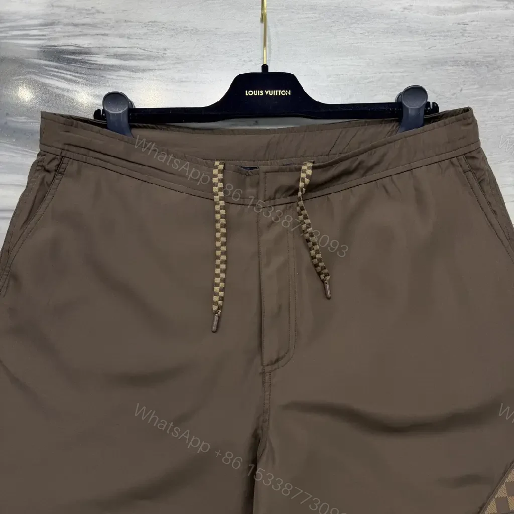 View 7 of Brown Nylon Casual Shorts Louis Vuitton Logo Patch Shorts