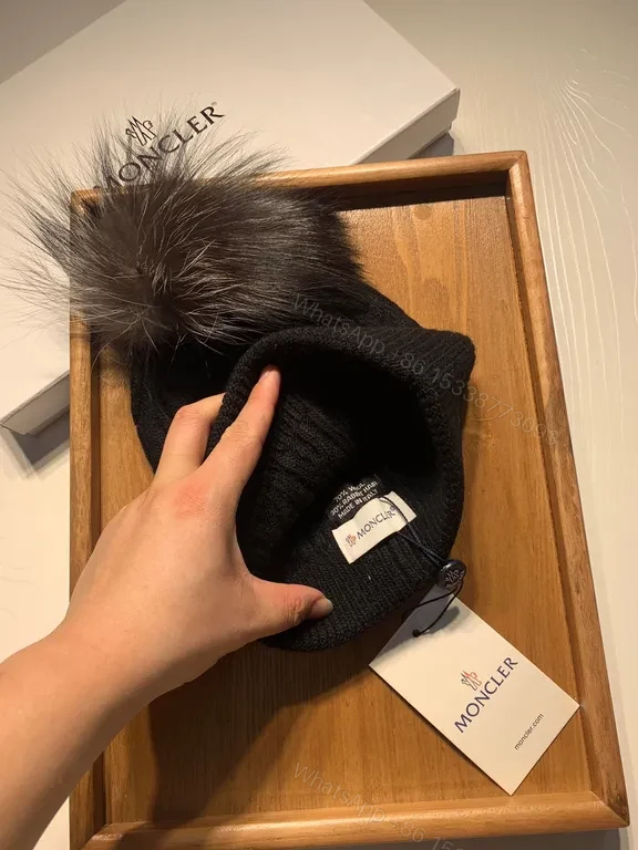View 3 of Cozy Black Moncler Beanie: Plush Fur Pom-Pom Warm Wool-Blend Knit