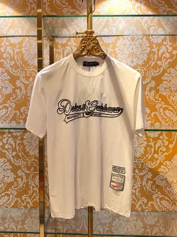 Minimalist White Cotton Tee with Subtle Front Logo and Patches — view 1