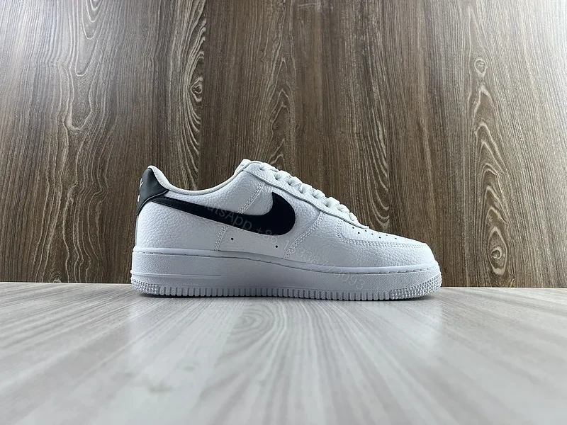 View 2 of White Leather Sneaker + Leather + Minimalist + Bold Swoosh + Classic Air Force Style