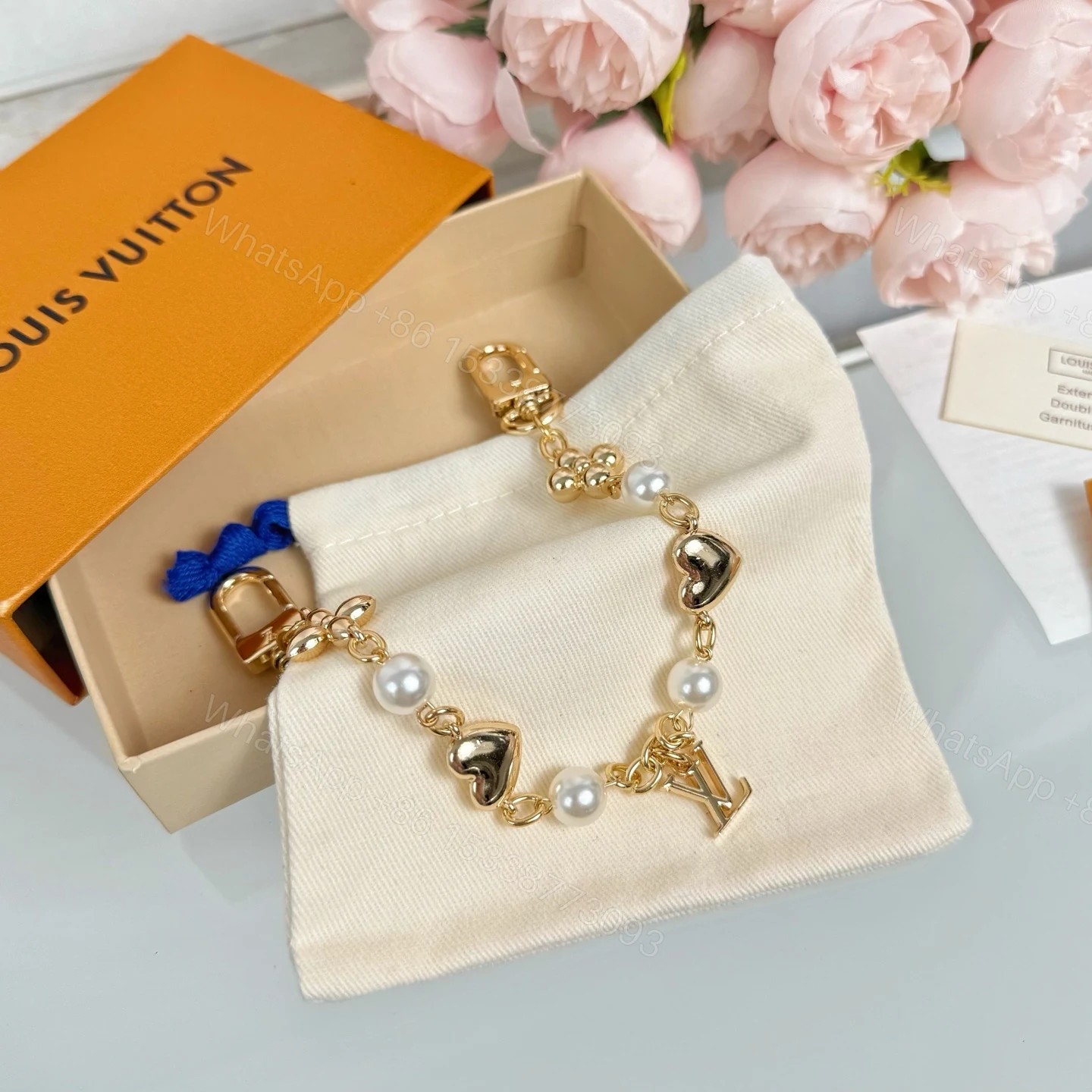 View 12 of Louis Vuitton Lv Logo Bag Charms