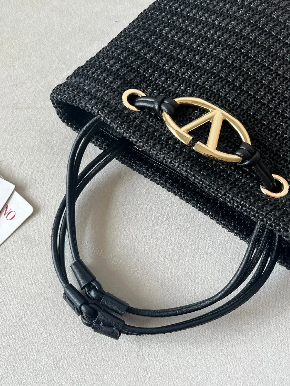 View 5 of Compact Black Knit Bag with Gold Hardware: Everyday Luxury Bag