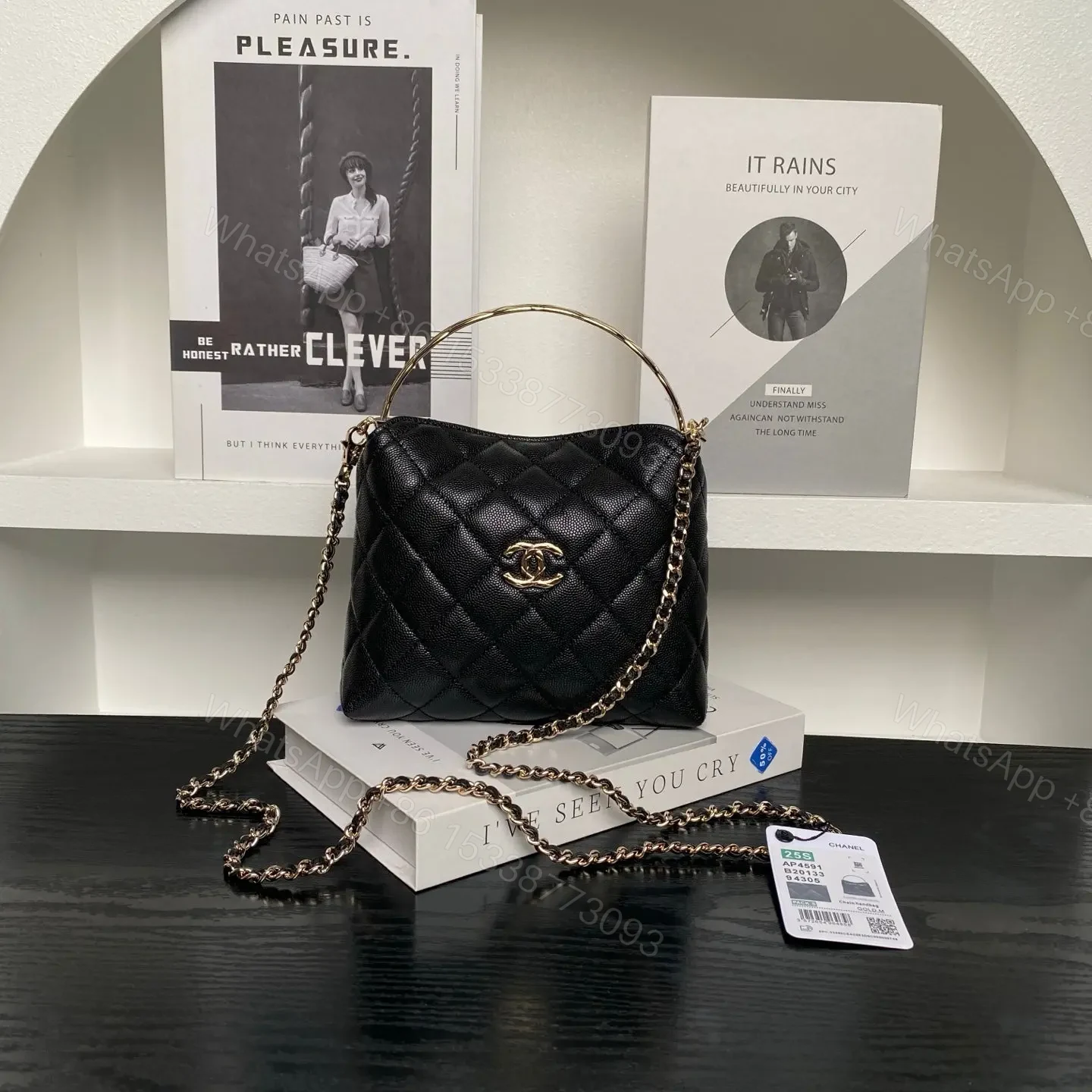 Chanel 24A Hobo Handbag in black quilted caviar leather — view 1