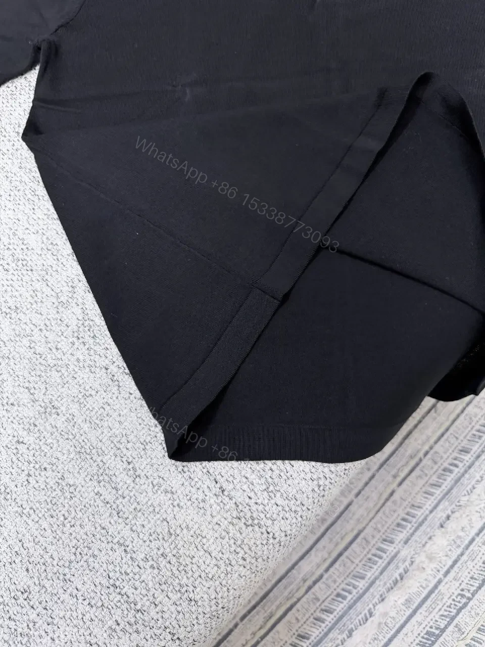 View 10 of Black Polo with Subtle Gold Logo - Refined Everyday Versatility
