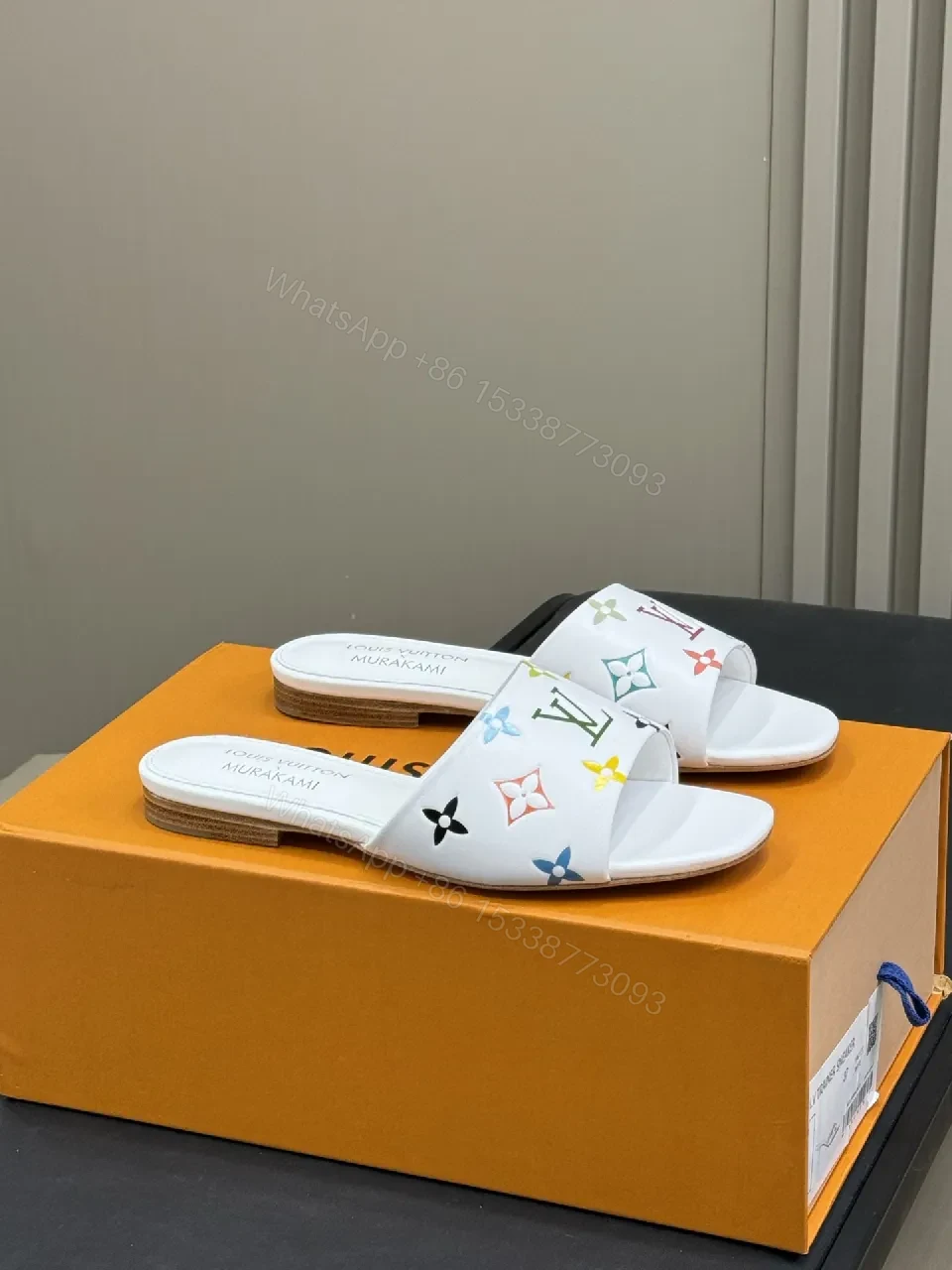White Leather Slides with Multicolor Monogram Detailing - Modern Luxury Comfort — view 1