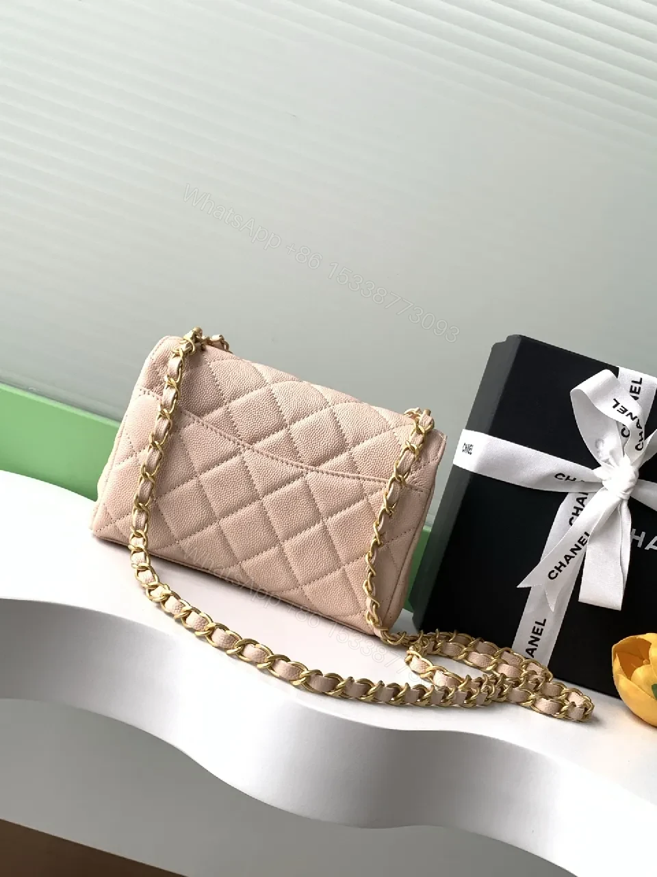 View 5 of Soft Pink Quilted Flap Bag with Gold Chain - Compact Luxury