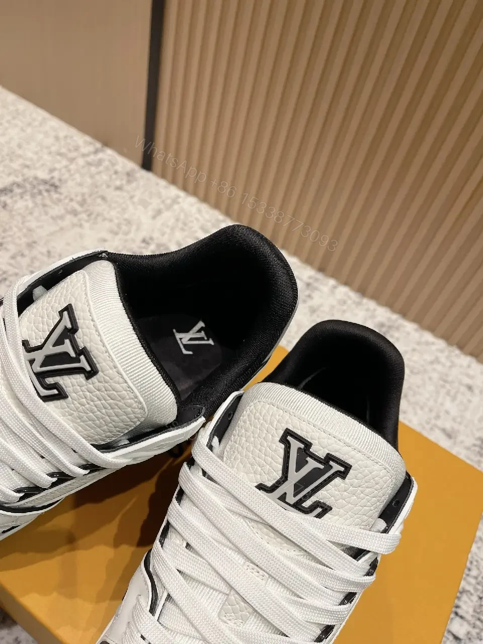 View 5 of White Leather Runner Sneakers with LV Detailing