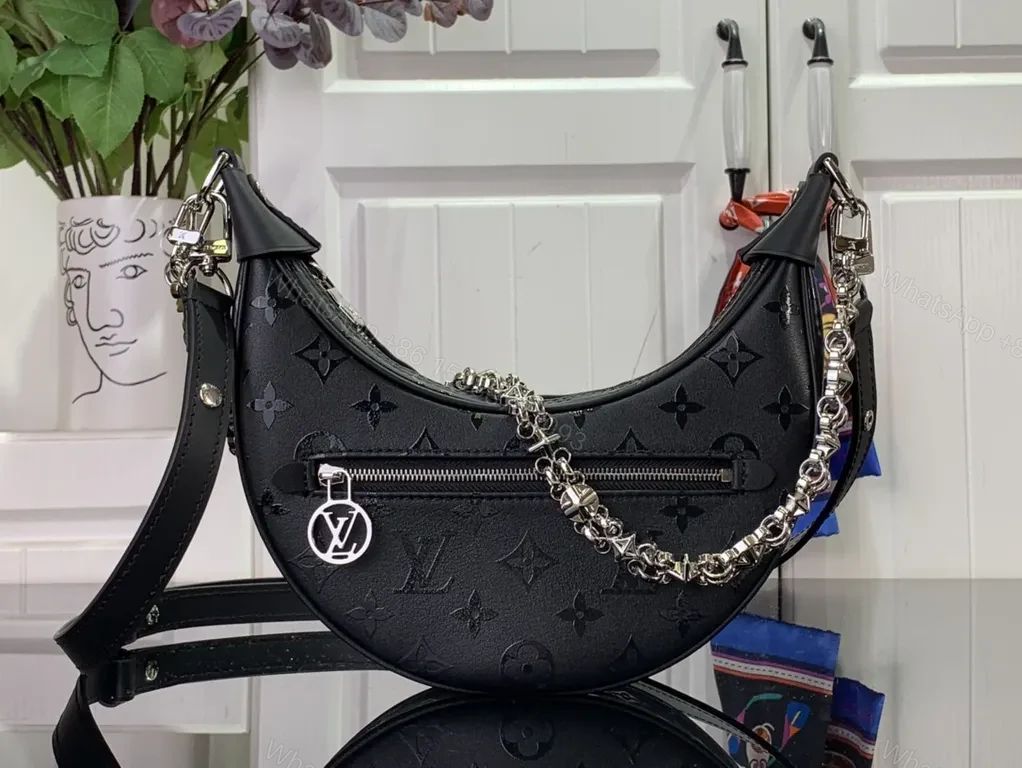 View 5 of Hologram Monogram Crescent Bag: Modern Luxury, Versatile Carry