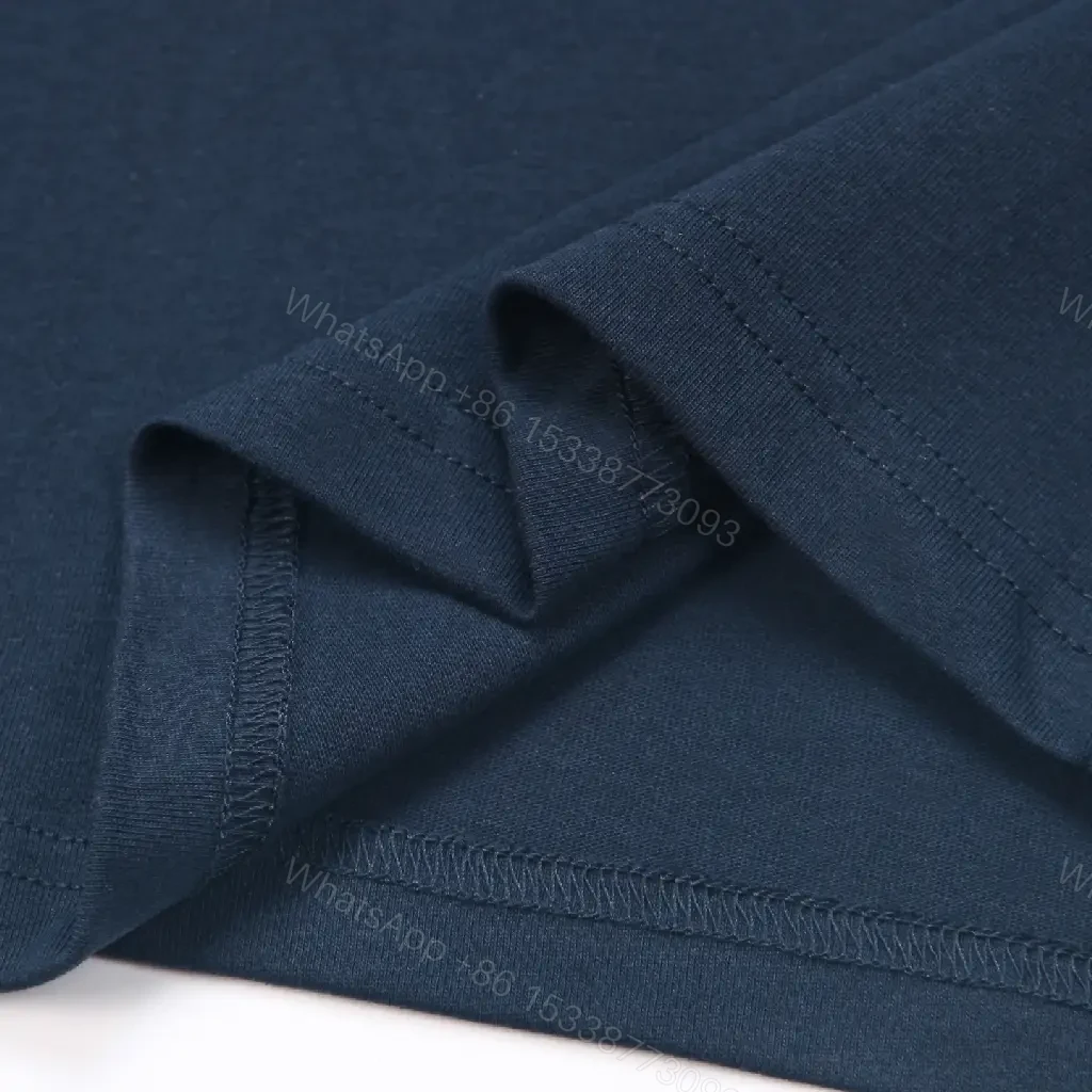 View 7 of Navy Cotton Relaxed Tee with Subtle Graphic Detail