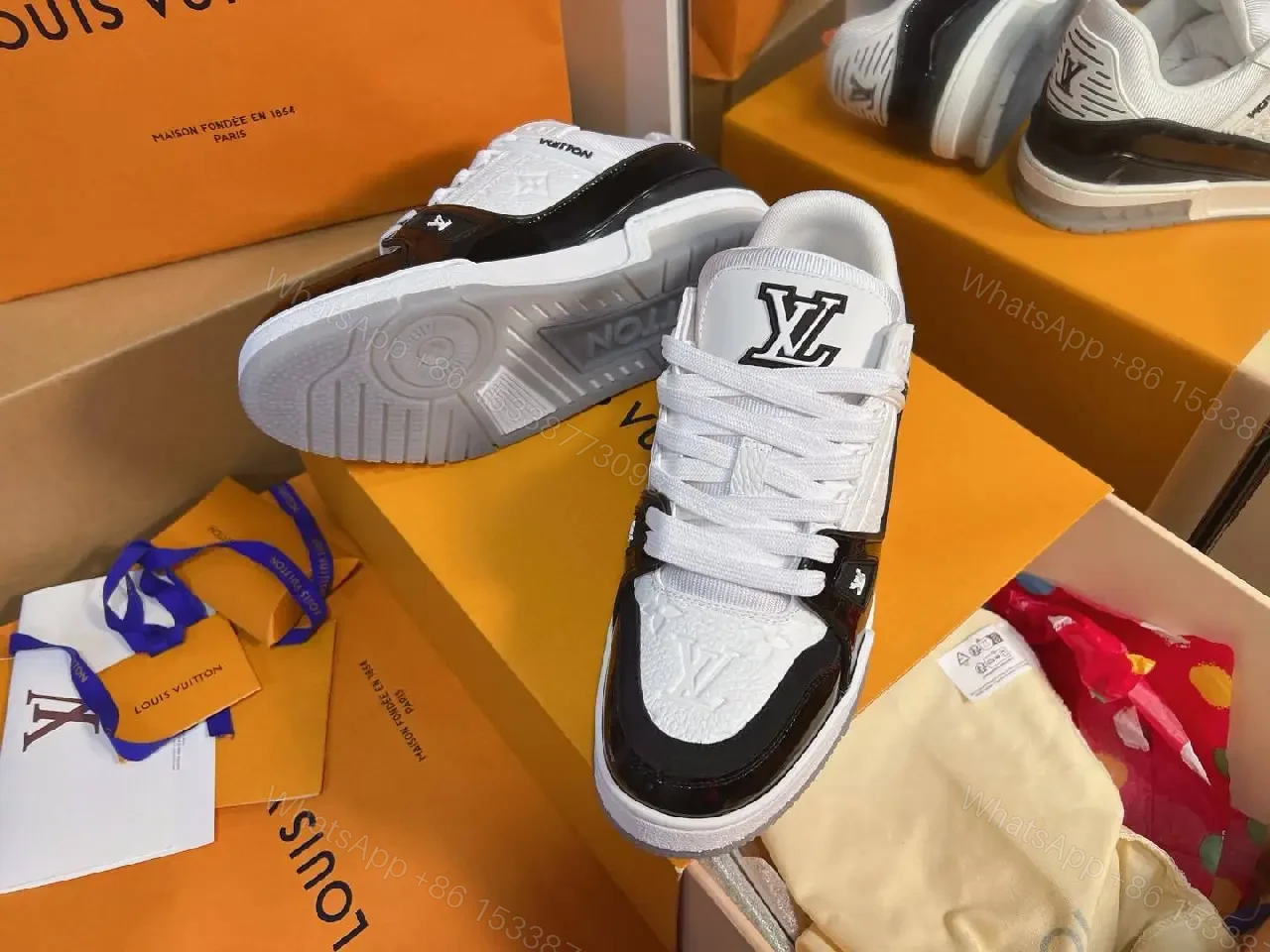 View 7 of Two-Tone Luxe Sneaker: Premium Comfort & Monogram Accent
