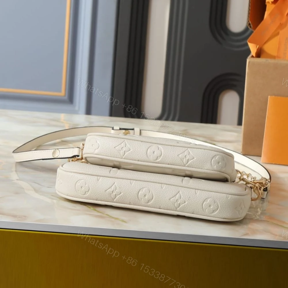 View 5 of Louis Vuitton Multi Pochette Accessoires Monogram Empreinte Cream 25Cm