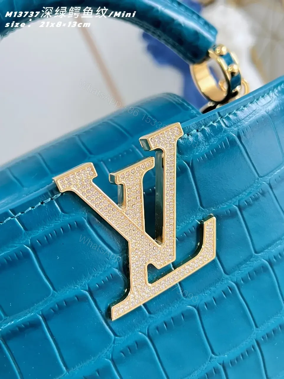 View 2 of Teal Crocodile-Texture Mini Bag with Gold Emblem