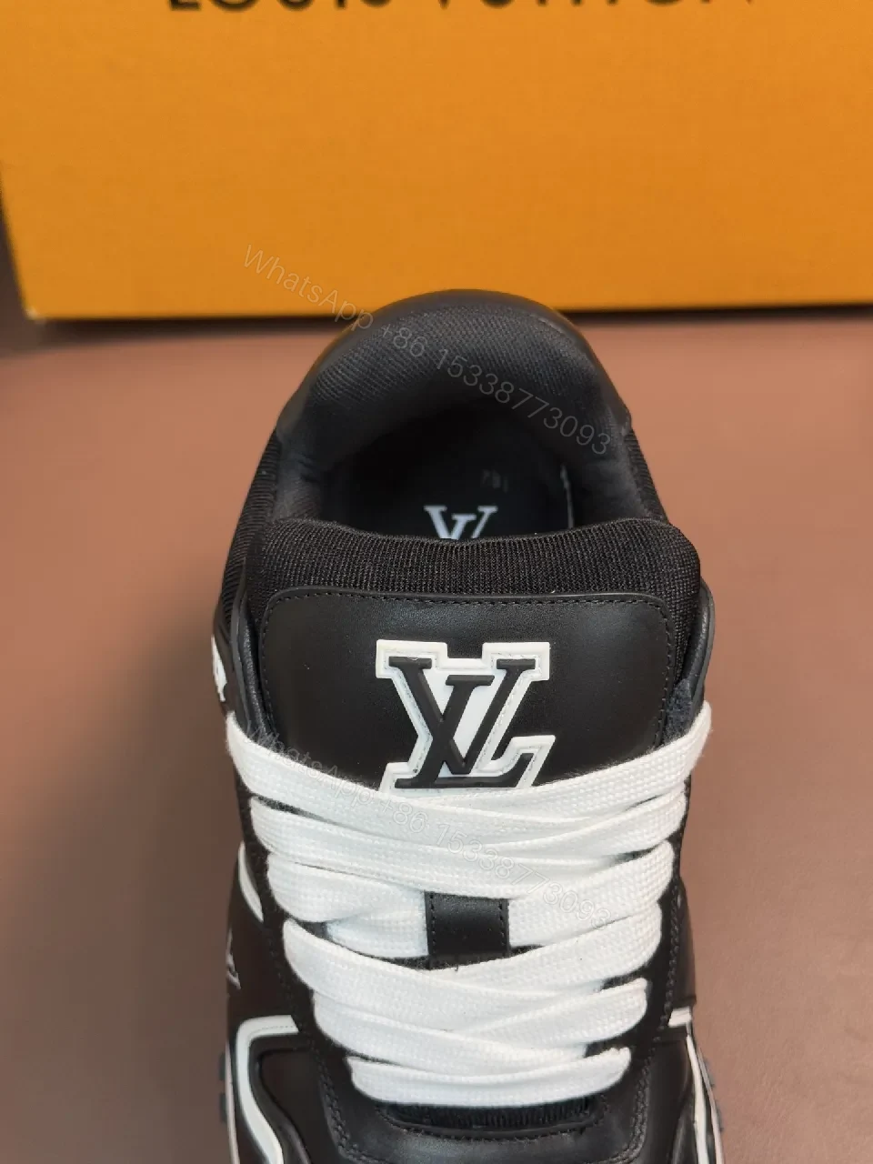 View 7 of Bold Contrast Leather Sneakers - High-Top Luxury Comfort