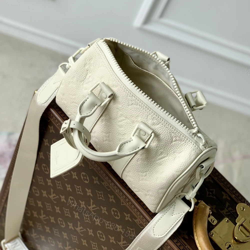 View 6 of Louis Vuitton Keepall Bandoulière 25 Bag Cream 25Cm M24434