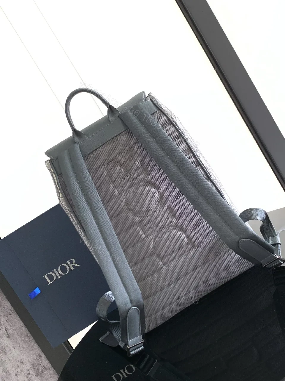 View 9 of Compact Monogram Luxe Backpack with Structured Pocketing