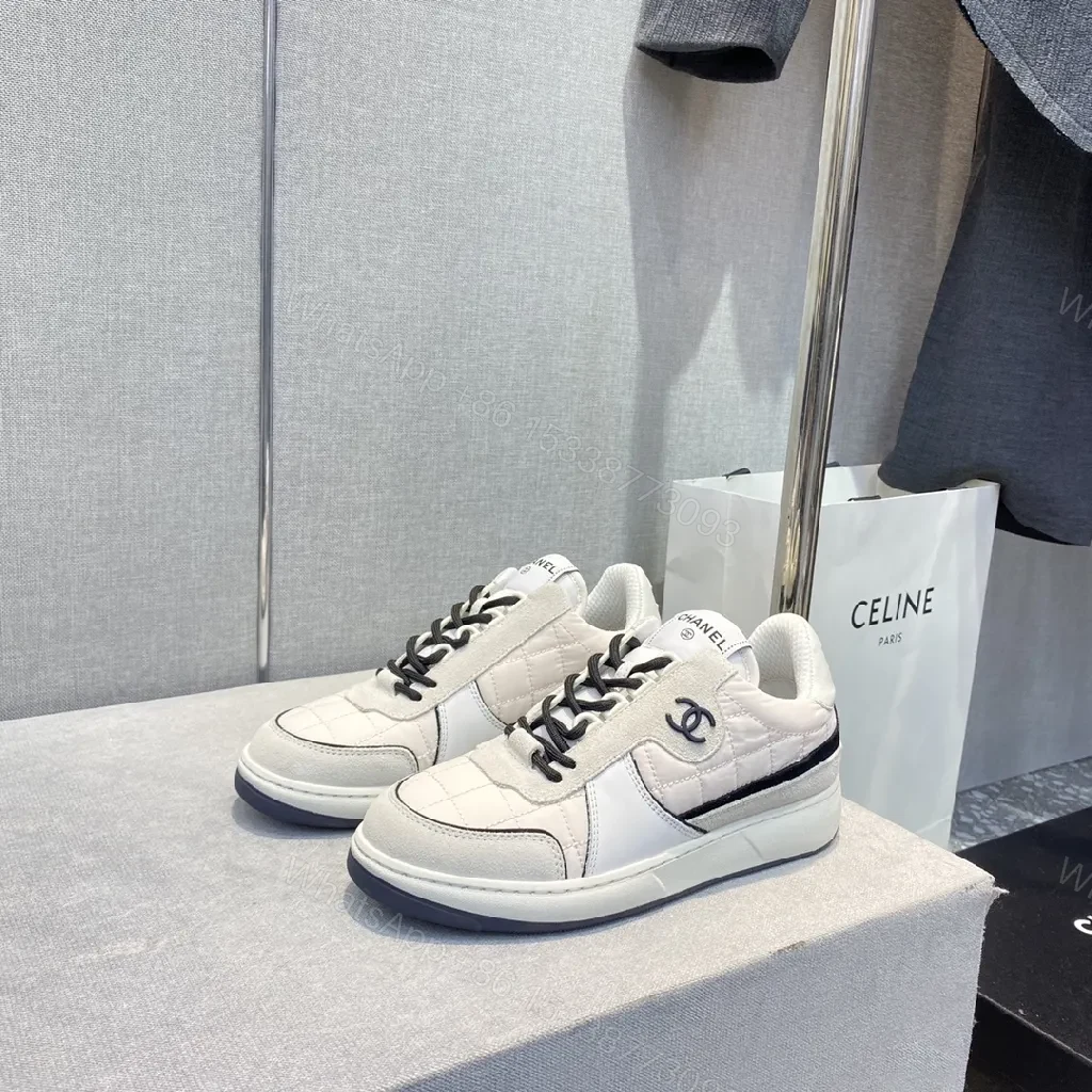 View 2 of White Leather-Trim Sneaker with Quilted Detail, Luxury Casual Sneaker