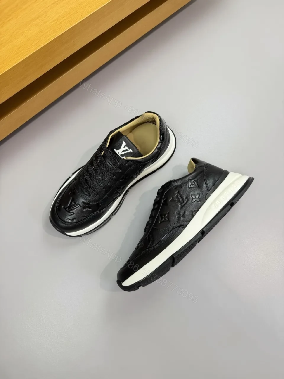 View 3 of Black Leather Trainer with Subtle Monogram Detailing - Everyday Luxe Comfort