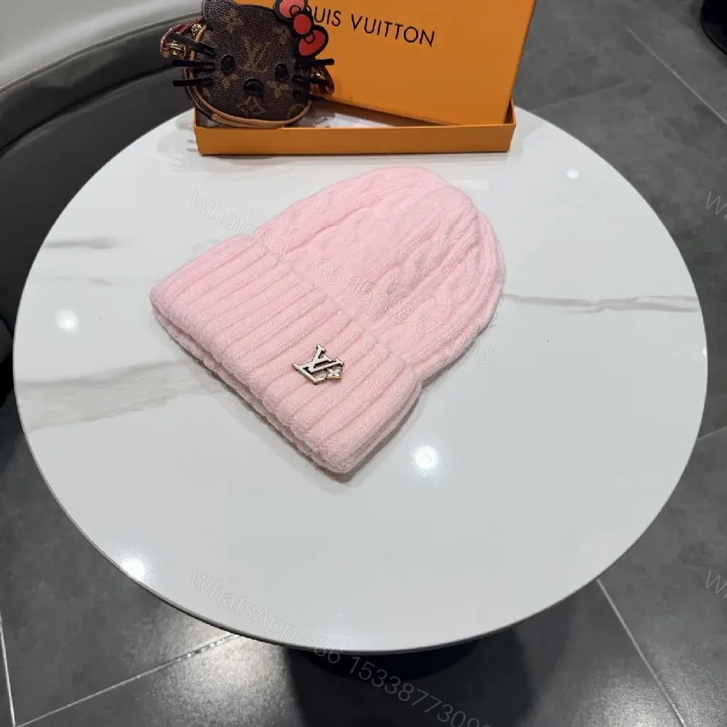 View 4 of Pastel Knit Beanie with Silver Emblem – Luxe Everyday Accessory