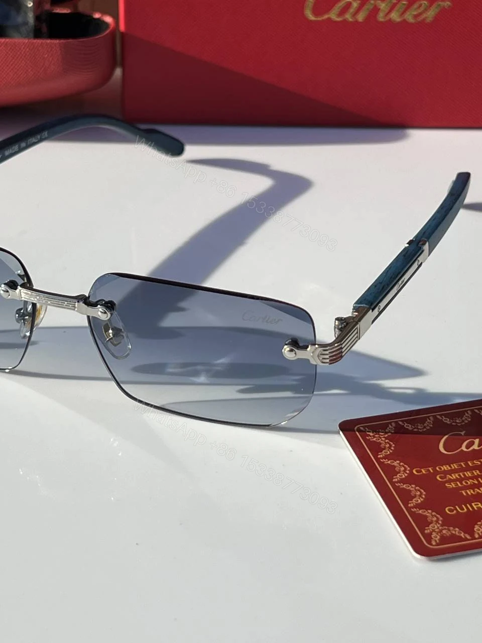 View 5 of First Copy Cartier Rimless Blue Tint Sunglasses Silver Frame Unisex UV Protection